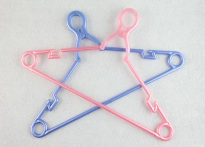 China Flexible Plastic Tubular Hangers , Pink / White Plastic Coat Hangers Household Use for sale