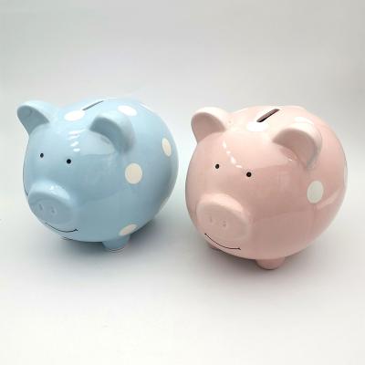 China Wholesale custom ceramic pig coin bank eco-friendly pink or bule atmosphere for sale