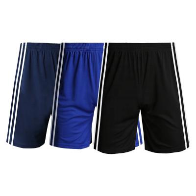 China Custom shorts factory direct sales pure color football basketball shorts man shorts with pockets for sports for sale