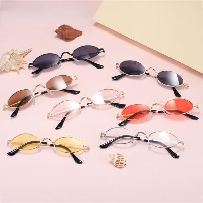 China Fashion Sunglasses Fashion Metal Children's Sunglasses Small Oval Frame Part Retro Sunglasses for sale