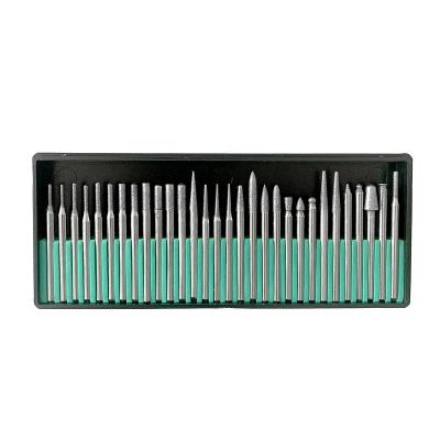 China Carbon Steel & diamond powder XUNDA 30pcs/set 3.17 rotary shank tools jade cutting burr set diamond mounting point for polishing and engraving for sale