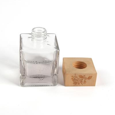 China Non Spill Custom Design Wooden Lid For Perfume Bottle for sale