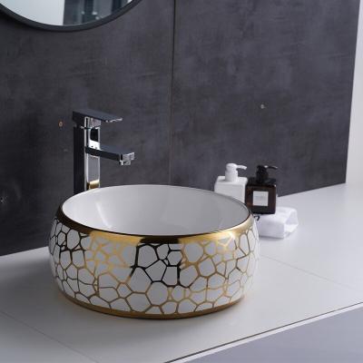 China Modern Gold Trim Porcelain Bathroom Sink Ceramic Wash Basin For Sale for sale