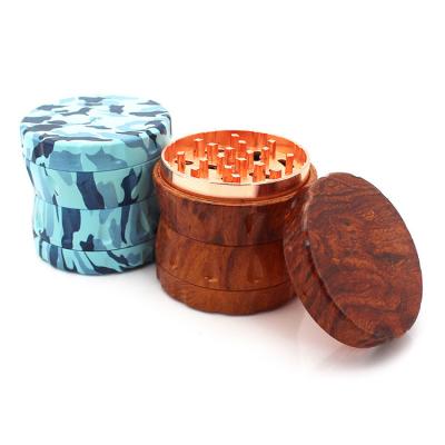 China Different designs of electric herb grinder flower 4 layers ceramic grinder with high quality for sale