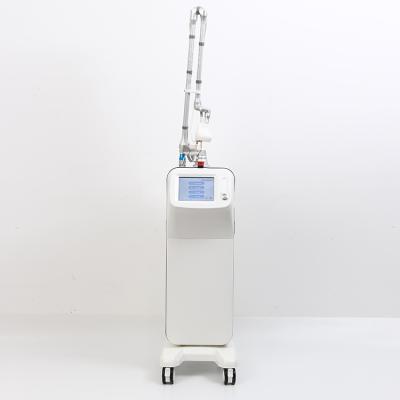 China Pigment Removal 40W Glass Tube CO2 Laser Partial Face Lifting Skin Tightening Machine for sale