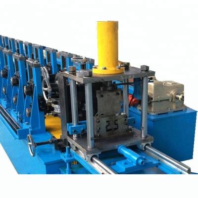 China Building Material Shops Steel Pallet Tire Warehouse Storage Rack Shelf Roll Forming Machine for sale