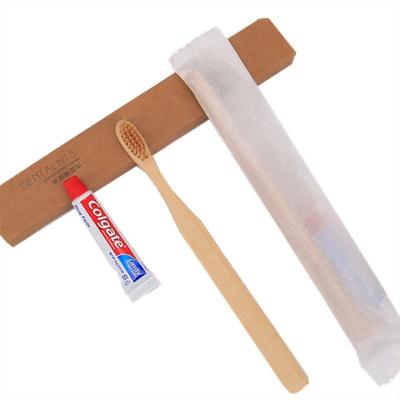 China Hotel Disposable Bamboo Toothbrush Suite Bamboo Comb Wrapping Paper for sale