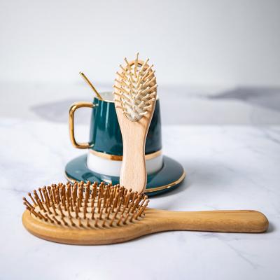 China Travel Manufacturers Promotional Natural Bamboo Hair Brush Scalp Massage Bamboo Comb for sale