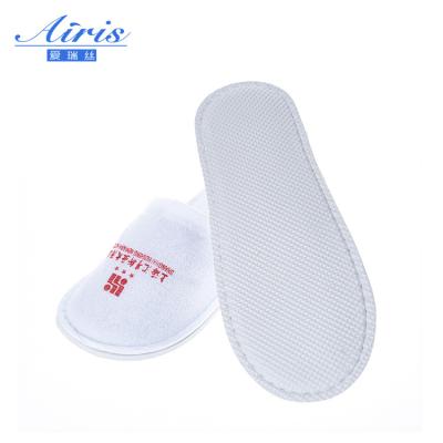 China Disposable Compressed Slippers Wholesale SPA Hotel White Disposable Slippers Quick Dry For Motel for sale