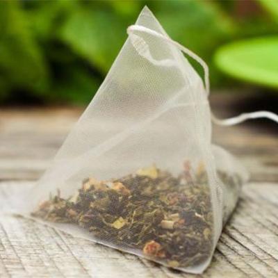 China Custom Biodegradable PLA Cornstarch Tea Filter Empty Pyramid Herbal Tea Supplier Tea Bags for sale