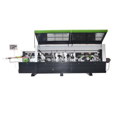 China Full Automatic Building Material Stores Factory Supply Woodworking Edging Machine With Corner Trimming Function for sale