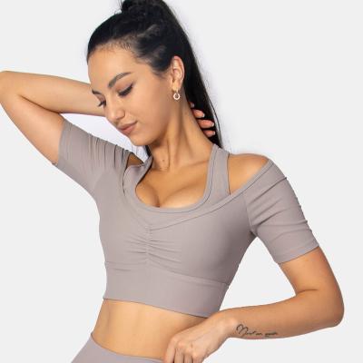 China Breathable Women's Seamless Workout Yoga Shorts Ribbed Sleeve Tops Sexy Sports Bra for sale