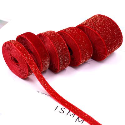 China 2022 new 10-38mm high tenacity glitter bows non-elastic red gold ornament ribbon and silver velvet ribbon bunion hair for sale