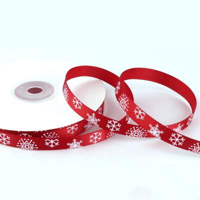 China Luster Polyester Ribbon Custom 6-40mm Wide Printed Christmas Santa Snowflake Christmas Tree Gifts Baked Wrapping Decoration for sale