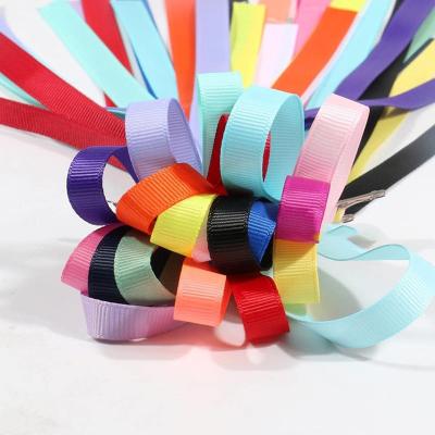 China Factory wholesale decorative ribbon grosgrain ribbon gift box bow ribbon holiday decoration 15mm wide viable vase solid packing for sale