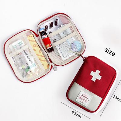 China Polyester factory wholesale medical emergency portable bag travel first aid kit bag outdoor empty bags in stock for sale