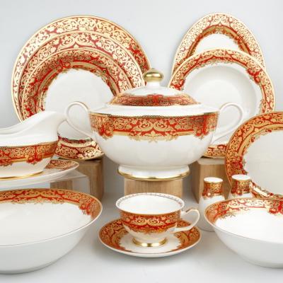 China Sustainable Juego De Vajilla Completo Ceramic Dinnerware Party Embossed Gold Fancy Cups Porcelain Red Dinner Set for sale