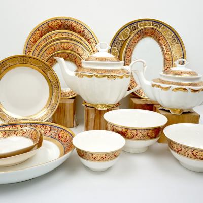 China New Sustainable Bone China Uzbekistan Luxury Porcelain Embossed Gold Vintage Style Dinnerware Set for sale