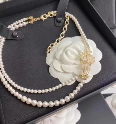 China FASHIONABLE Top Rank Famous Suppliers and Pearl Necklace and Hair Wholesale Designer Brand Necklaces Clip for sale