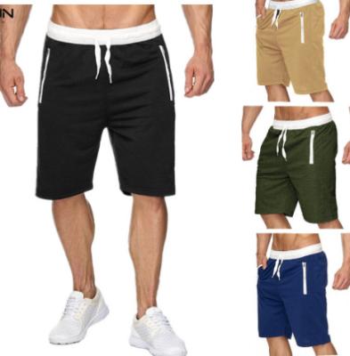 China Anti-wrinkle 2022 new summer men's casual beach pants plus size cotton shorts five point sports pants for sale