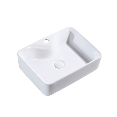 China Undercounter Modern Simple Modern Bathroom Ceramic Wash Hole Rectangular Sink Art Basin for sale