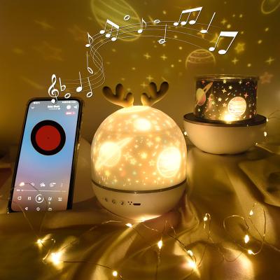 China Eco-friendly Deer Music Projection Lamp Night Light With BT Speaker Rotating Starry Sky Bedroom Bedside Lamp Decoration Kids Christmas for sale