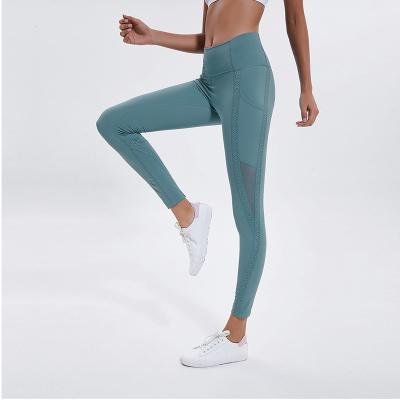 China Wholesales Hole Antibacterial High Quality Mesh Customized Logo Yoga Pants for sale