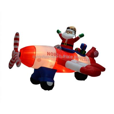 China Christmas Holiday Santa Character In Airplane For Giant Inflatable Christmas Decoration With Light OEM for sale