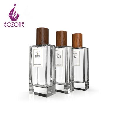 China Personal Care Customize Rectangular Luxury Empty Perfume Bottle With Wooden Cap for sale