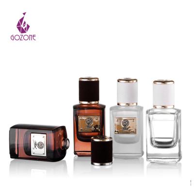 China Personal Care Customized Shape 50ml Square Glass Bottle Perfume Bottles With Spray for sale