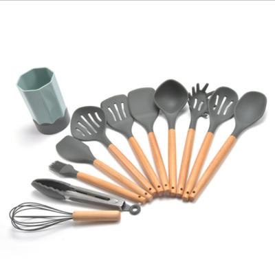 China Sustainable 11pcs Kitchen Tools Wood Spoon Spatula Handle Silicone Cookware ZGJ-0302 for sale