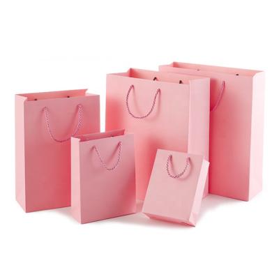 China Recycled Materials Xiaoyin Wholesale Pink Tote Bags With Your Own Logo Custom Luxury Gift Shopping Suitcase With Handles High Quality Paper Bags for sale