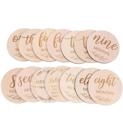 China Custom Baby Gift Europe Newborn Milestone Card Laser Engraved Photo Wooden Props Laser Cut Wooden Discs Cards Monthly Wooden Milestone Card for sale