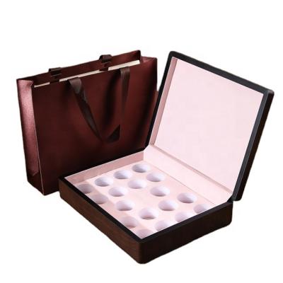 China High End Exquisite Solid Wooden Box Qimen Black Tea Gift Box Small Chinese Style 18 Pendulum Tea Boxes And Aluminum Cans for sale