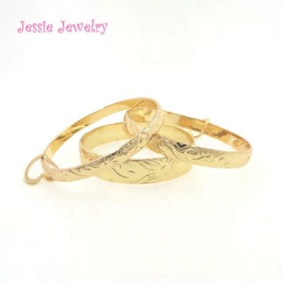 China H550 Gold Ethnic Hawaiian Bangle Bracelet Traditional Heirloom Plumeria Wave Bracelet for sale