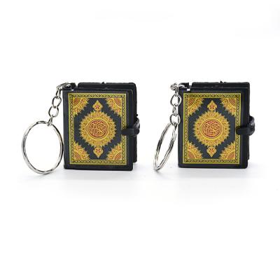 China Daily Life Women Cute Mini Arabic Quran Islamic Keychain Allah Yellow Paper Real Can Read Religious Keyring Dangle Fashion Jewelry for sale