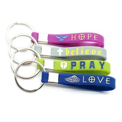 China Glow in the Dark Popular Bulk Religious Church Baptism Gifts Christian Inspirational Bible Keychain Silicone Bracelet Key Chain for sale