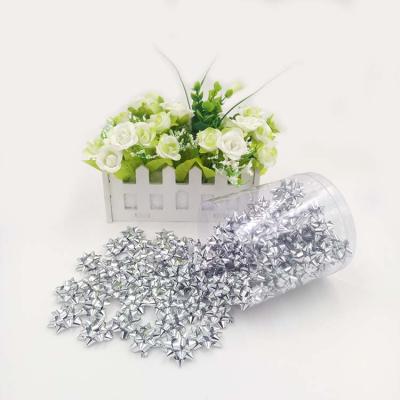 China Silver Mini Star Bow 100pk PET Ribbon Mini Star Bow Packed in tube box for retail for sale