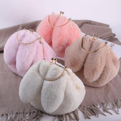 China Fashion Fur Women's Rabbit Ear Bags Plush Luxury Warm Wrist Bags Women's Fashion Furry Short Handle Grabs Girls Cute Handbags for sale