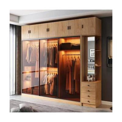 China Minimal Maintenance Modern Wood Color Melamine Swing Door Bedroom Wardrobe for Villa for sale