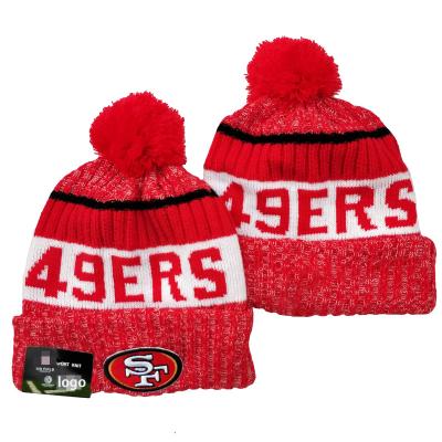 China COMMON Classic Buccaneer Slapped Head Pom Pom Beanie Winter Beanies With Jacquard Logo Fashion Knit Football Team Beanie for sale