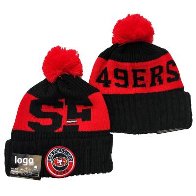 China COMMON Logo Buccaneer Seahawk Football Beanie Jacquard Pom Pom Cuffed Winter Beanies With Knit Football Hats for sale