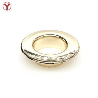 China Nickel Free Color 25mm Outer Diameter Shiny Gold Brass Grommet With Seal In Luxury Outlook for sale