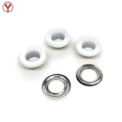 China Nickel free 11.5 mm diameter brass eyelet with metal seal in rubberized coated white for sale