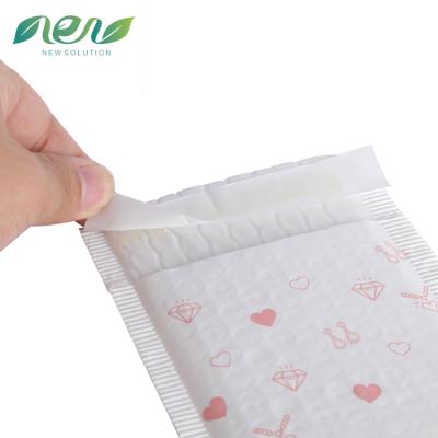 China Custom XMC 100% Biodegradable Cornstarch Logo Ecommerce Goods 4X6 4X8 6X9 6X10 Compostable Padded Bubble Wrap Mailing Ad for sale