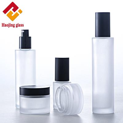 China e-set frosted glass cosmetic packaging set wholesale cosmetic packaging set for skin care for sale