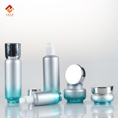 China E-Friendly Luxury Blue Empty Lotions And Face Creams Cosmetic Containers Skin Care Glass Bottle Set for sale