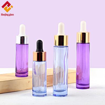 China 15ml 30ml Empty Purple Blue Glass Eco-friendly Essential Oil Dropper Bottle for sale