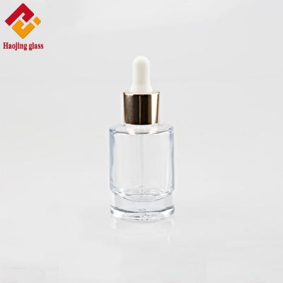 China 30ML shoulder essential oil dropper bottle e-friendly wholesale clear flat glass packaging for sale