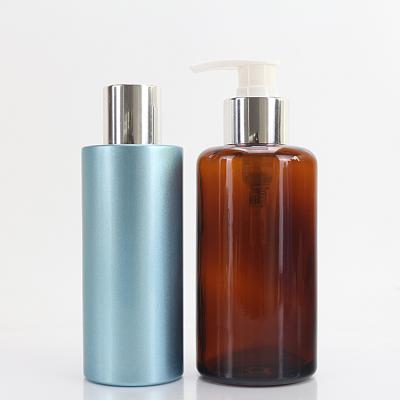 China 200ml Round Glass E - Friendly Amber Bottle With Silver Sanitizer Hand Pump Lotion Wash Bottle for sale